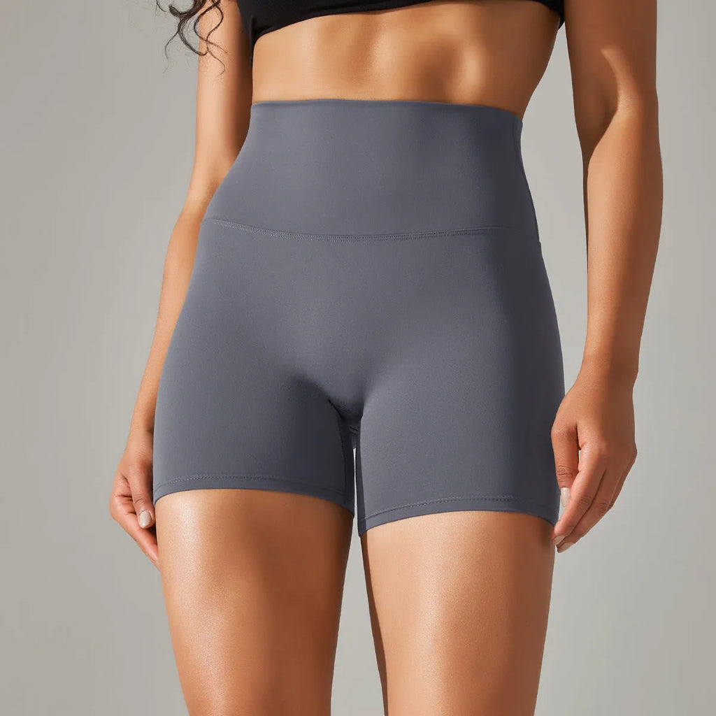 Women's high waist fitness pants in dark green with belly contracting design for athletic activities