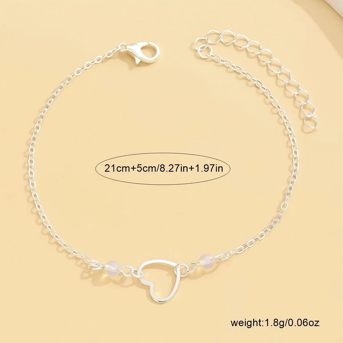 Women's adjustable anklet with heart pendant in gold and silver colours