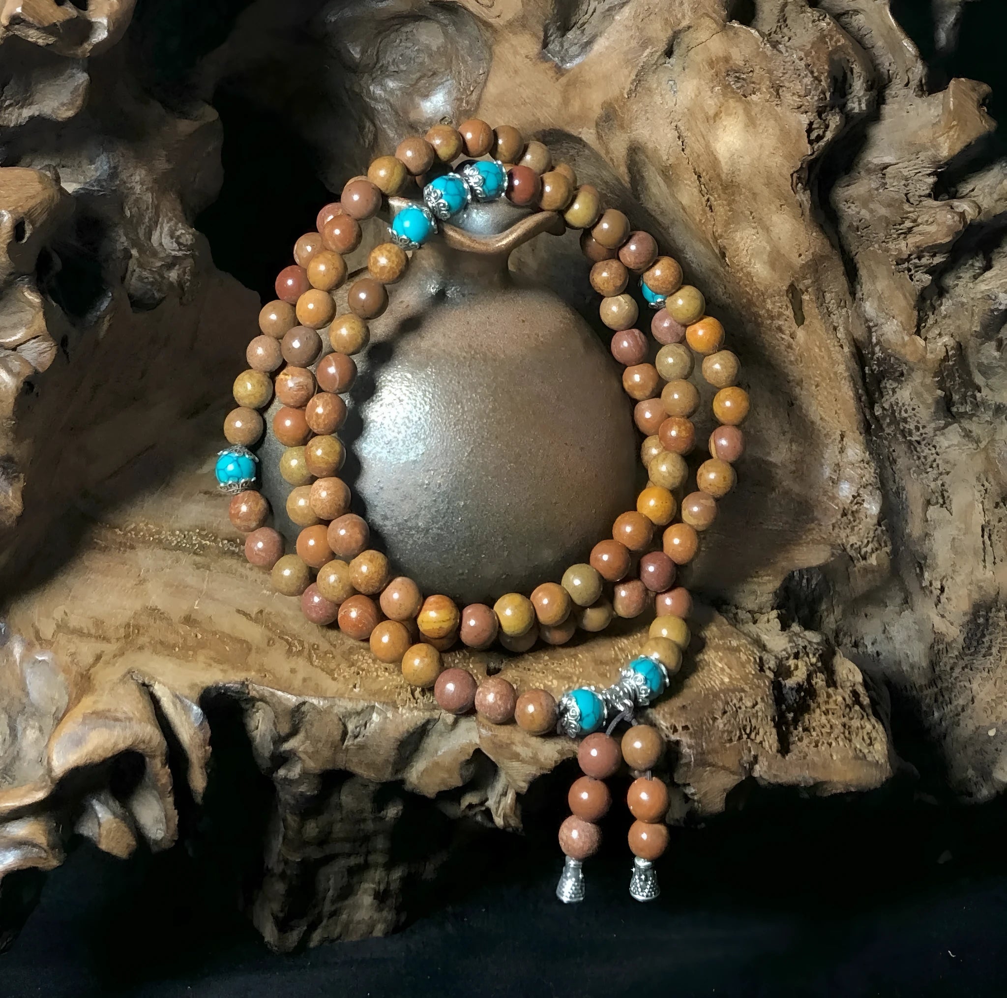 108-bead stone bracelet with geometric hand-polished beads measuring 5-6mm diameter
