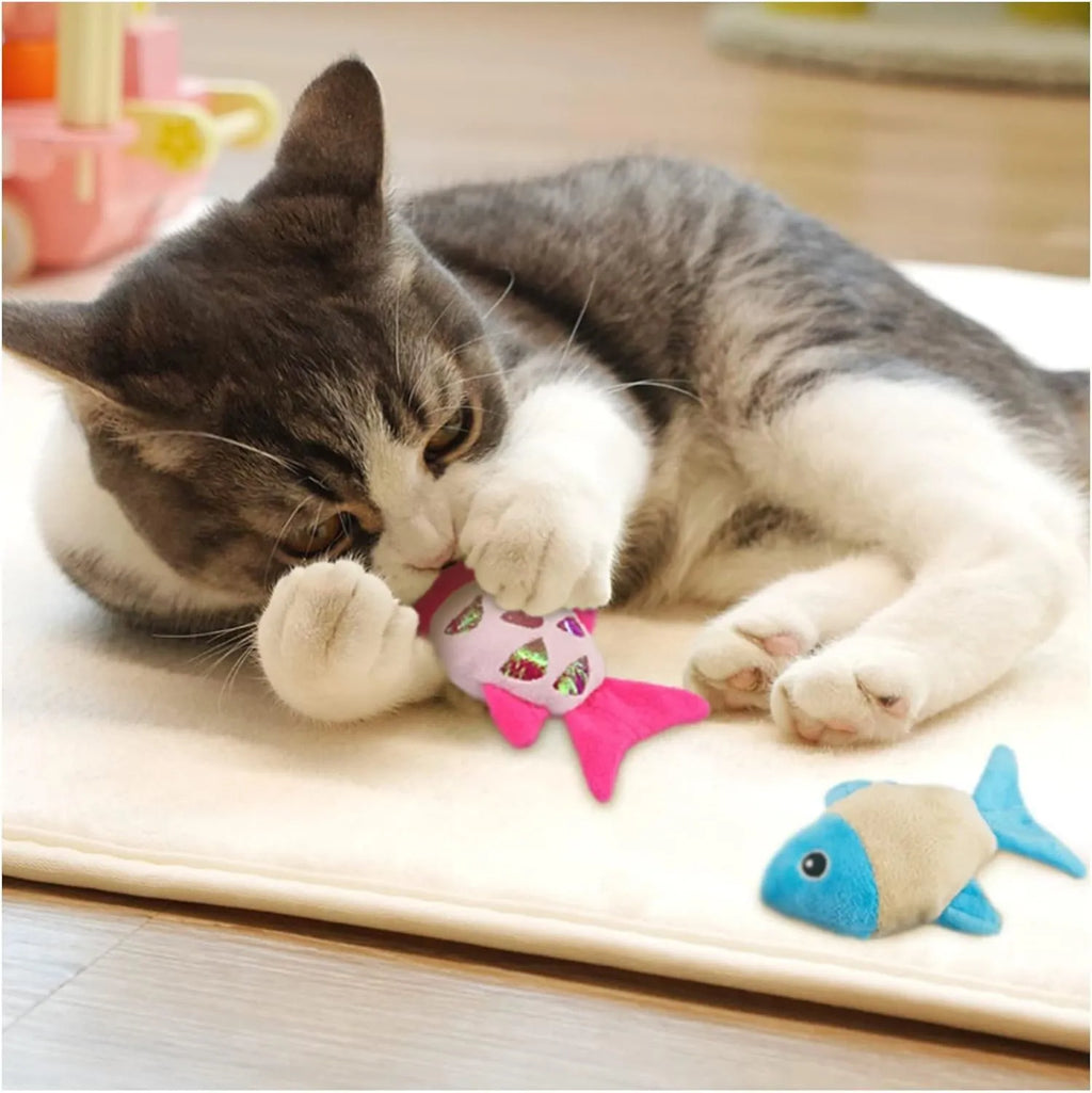 Two goldfish-shaped cat toys in blue, orange, and pink colours with soft plush exterior