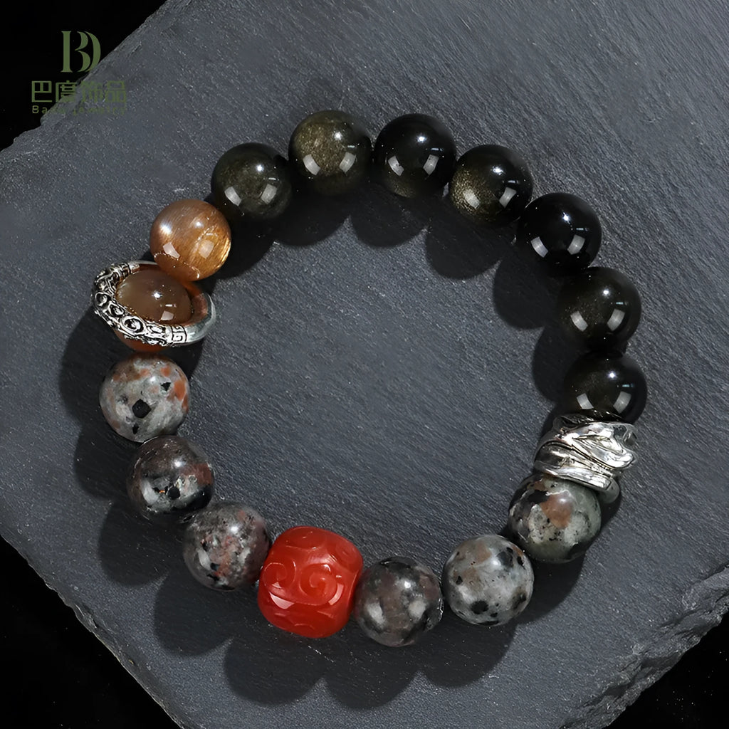 Handcrafted red agate and golden obsidian Wukong bracelet with flame stone pattern
