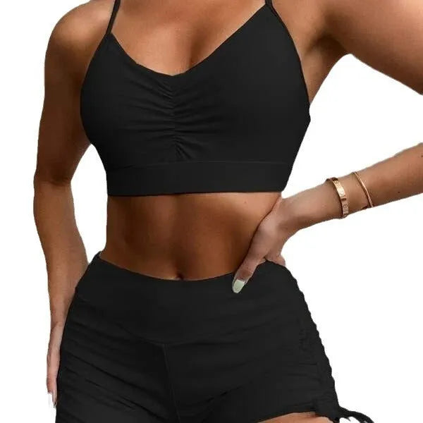 Purple and black women's high-waisted split bikini swimsuit on a mannequin.