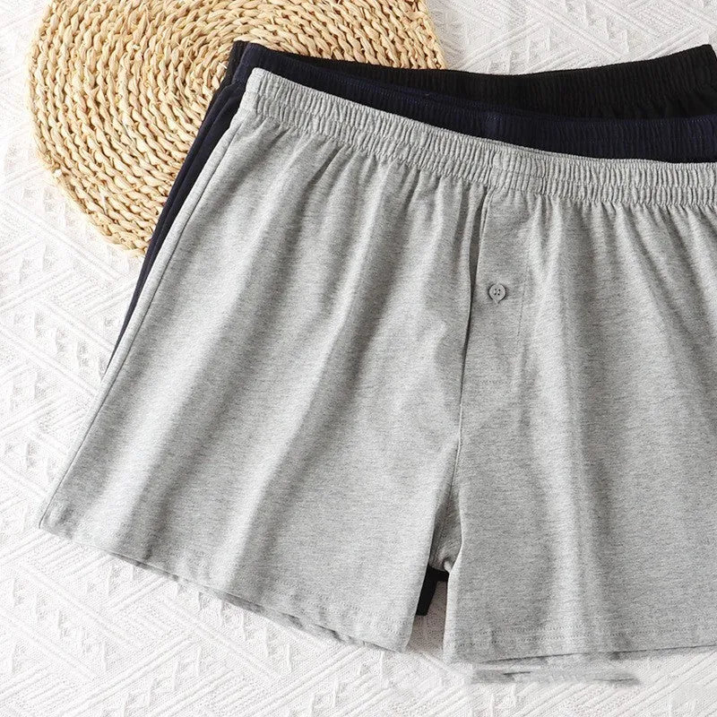 Men's pure cotton boxer shorts in black colour showing loose fit and high waist design