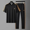 Men's blue short sleeve polyester sport suit set with matching trousers