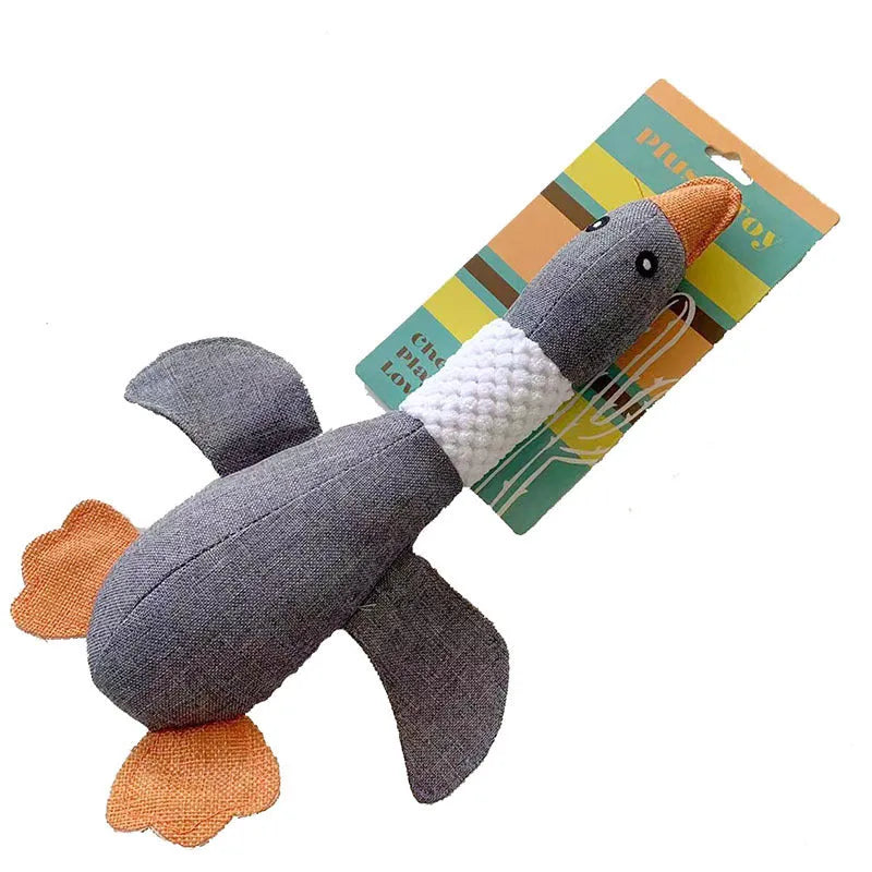 Blue plush duck dog toy with squeakers for chewing and fetch play.