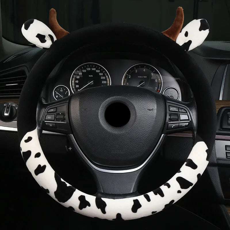 Short plush automotive steering wheel cover in black or coffee colour options showing soft fabric texture