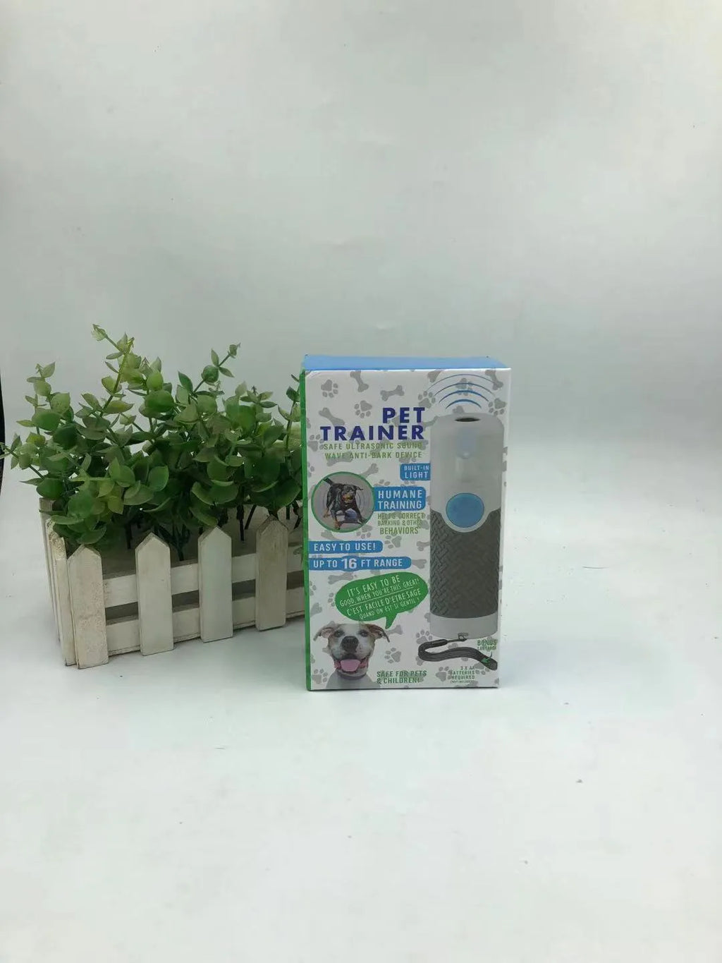 White ABS plastic handheld ultrasonic dog trainer for bark control training