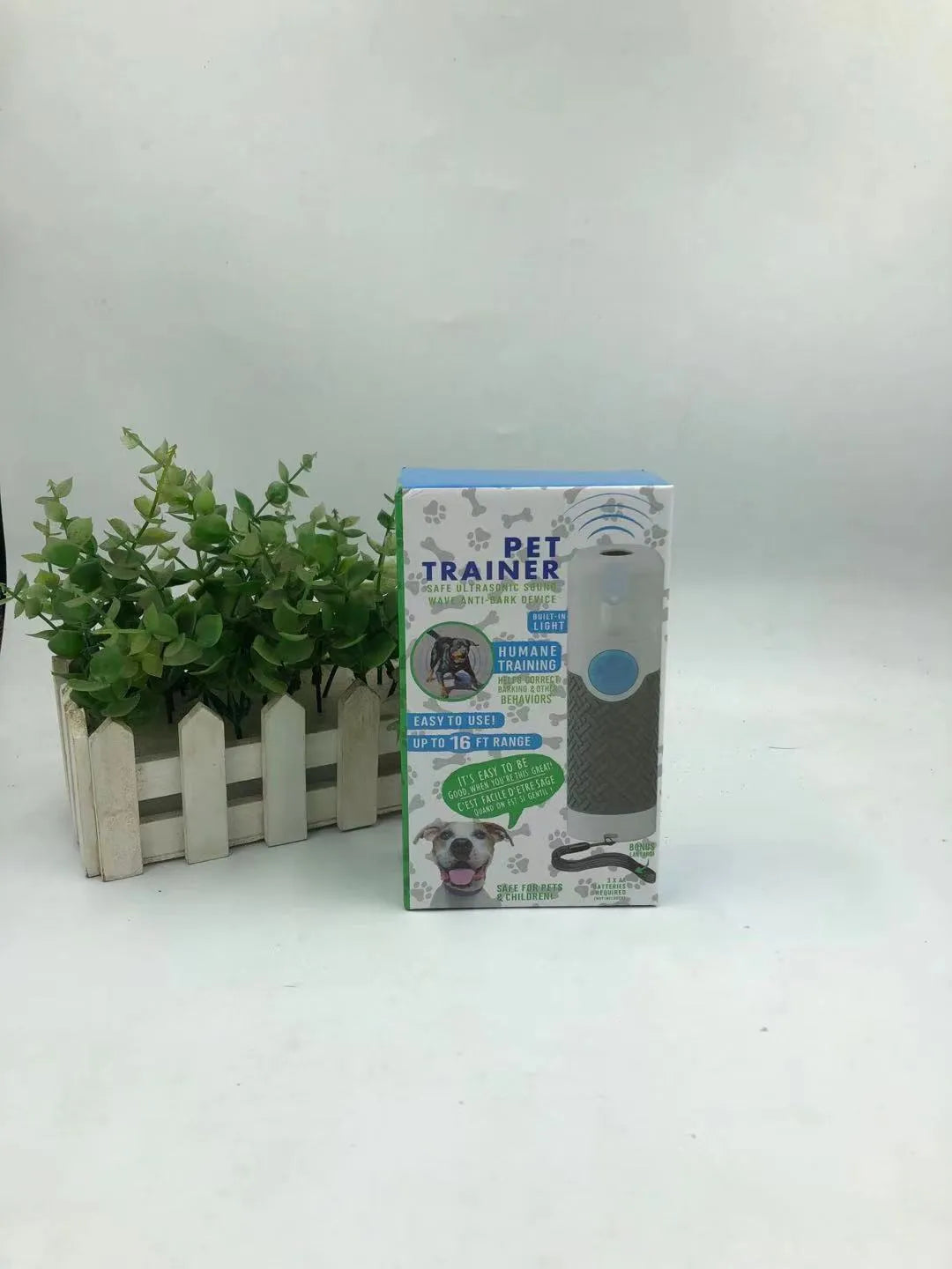 White ABS plastic handheld ultrasonic dog trainer for bark control training