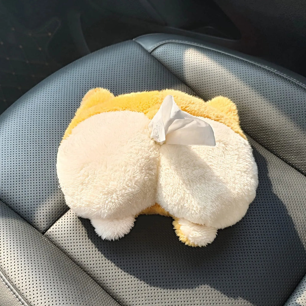 Soft yellow corgi butt-shaped tissue box cover with elastic strap for car sun visor.