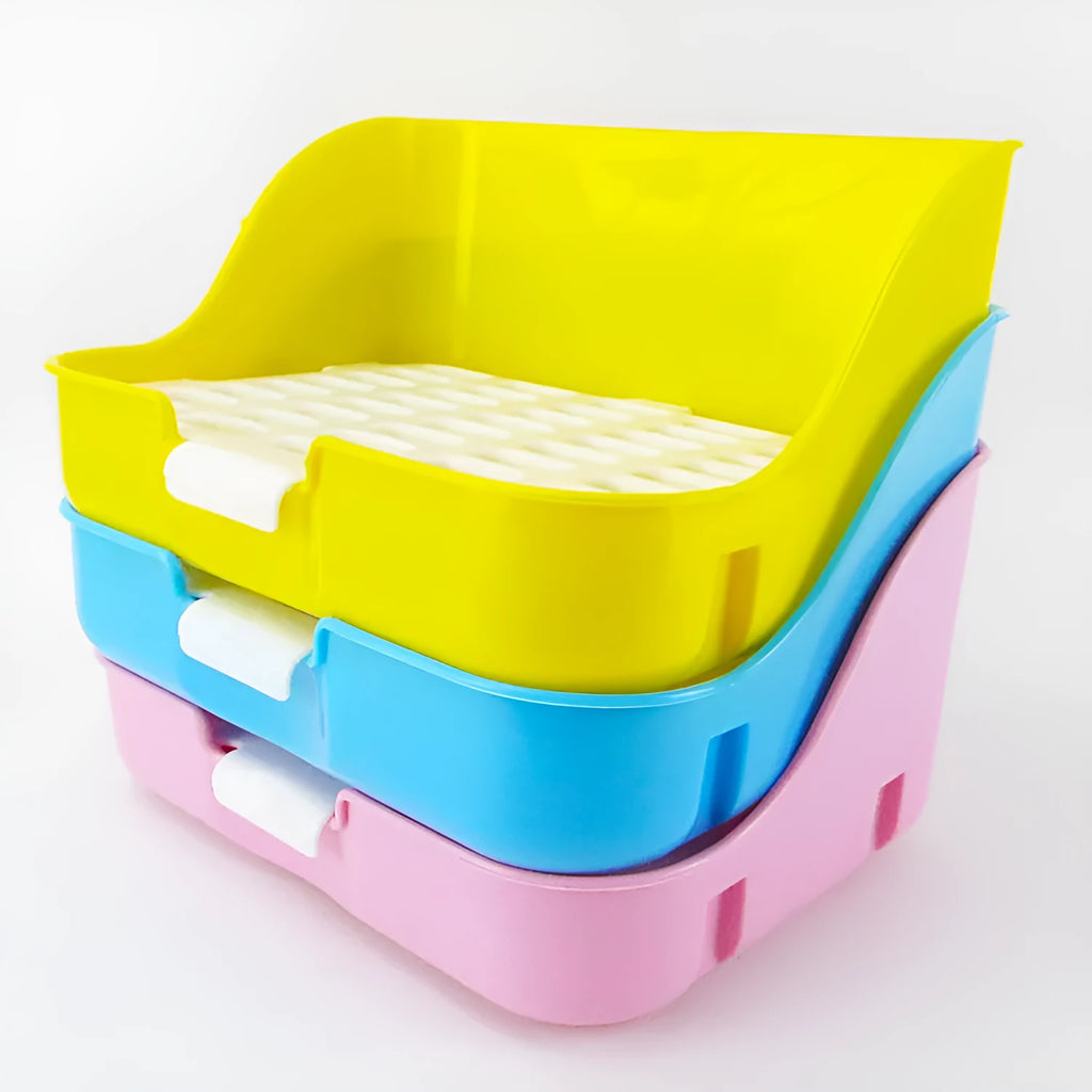 Large rectangular rabbit toilet in blue, measuring 30cm by 22cm by 16cm, with a shovel and garbage bag beside it on a surface