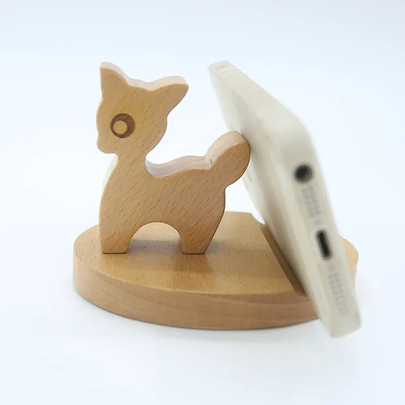 Handcrafted beech wood and resin lazy bracket mobile phone holder on a wooden desk