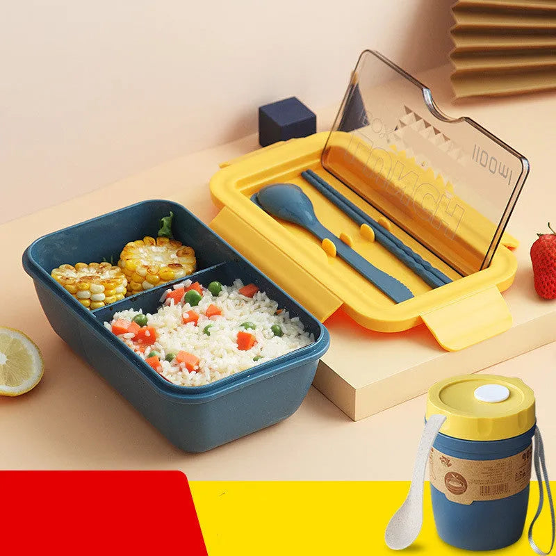 Green four-layer partitioned plastic bento lunch box with lid open.