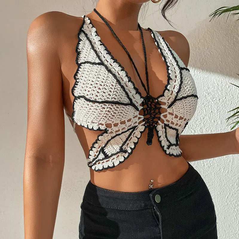 Women's black and white classic bikini swimsuit with colour block design and halter neck