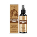 100ml bottle of hydrating hair care spray with ginger and rosemary extracts.