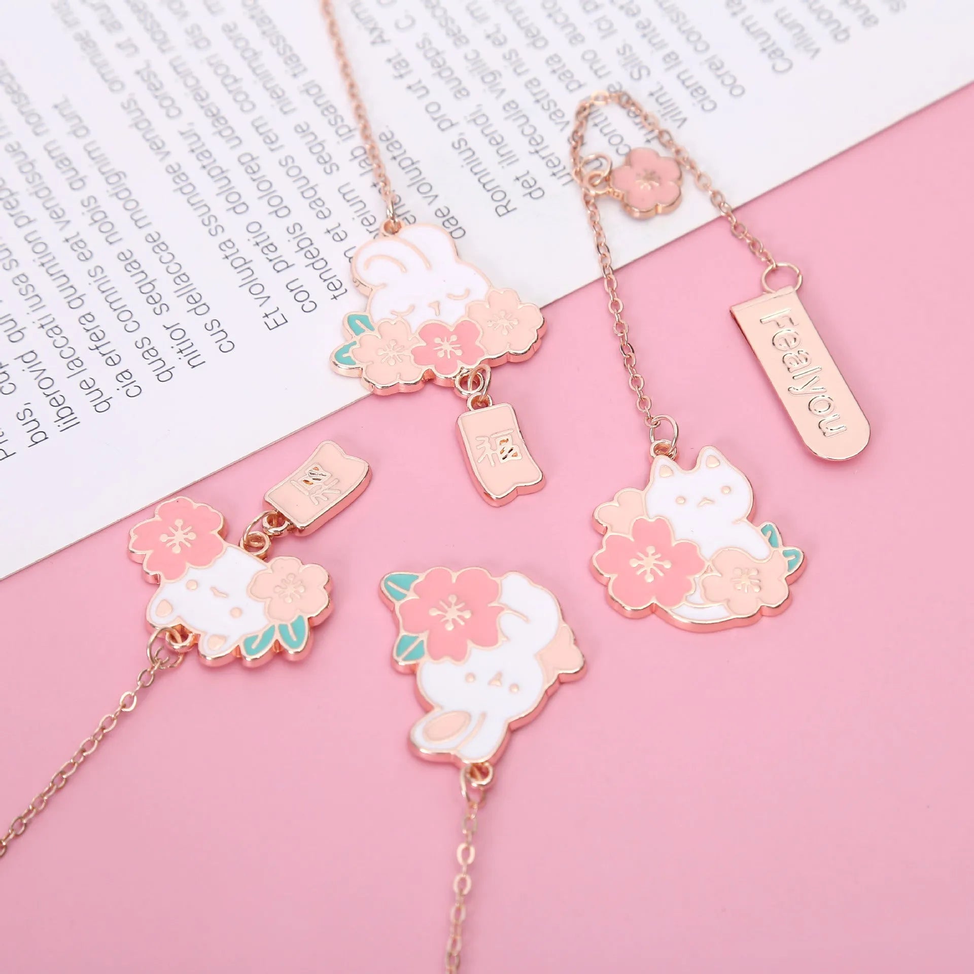Metal pendant bookmark with engraved cherry blossom cat design, small decorative charm for book marking