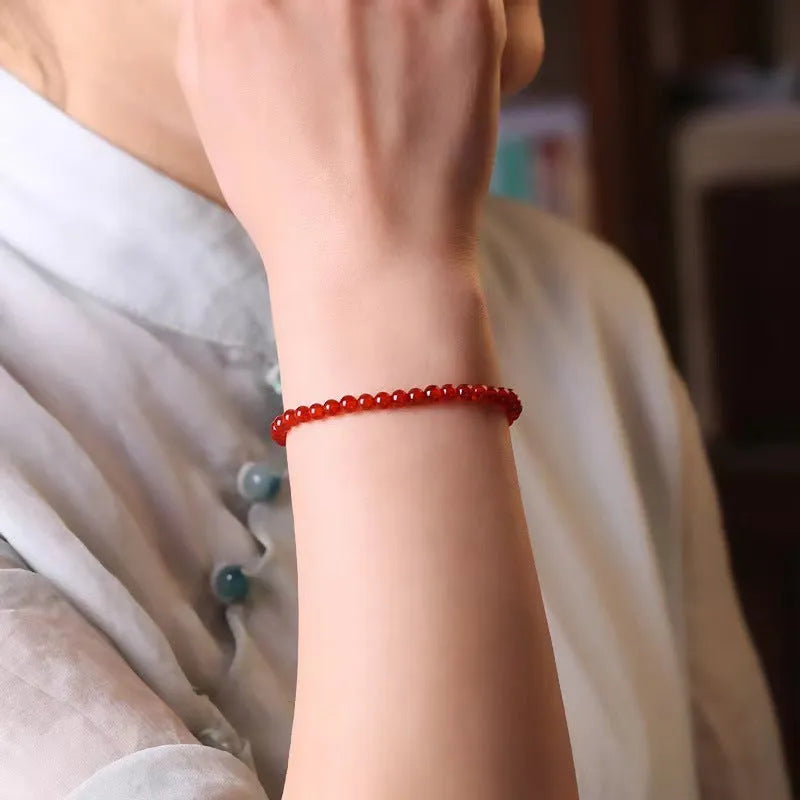 Ultra-thin red agate women's bracelet for travel commemoration gifts.