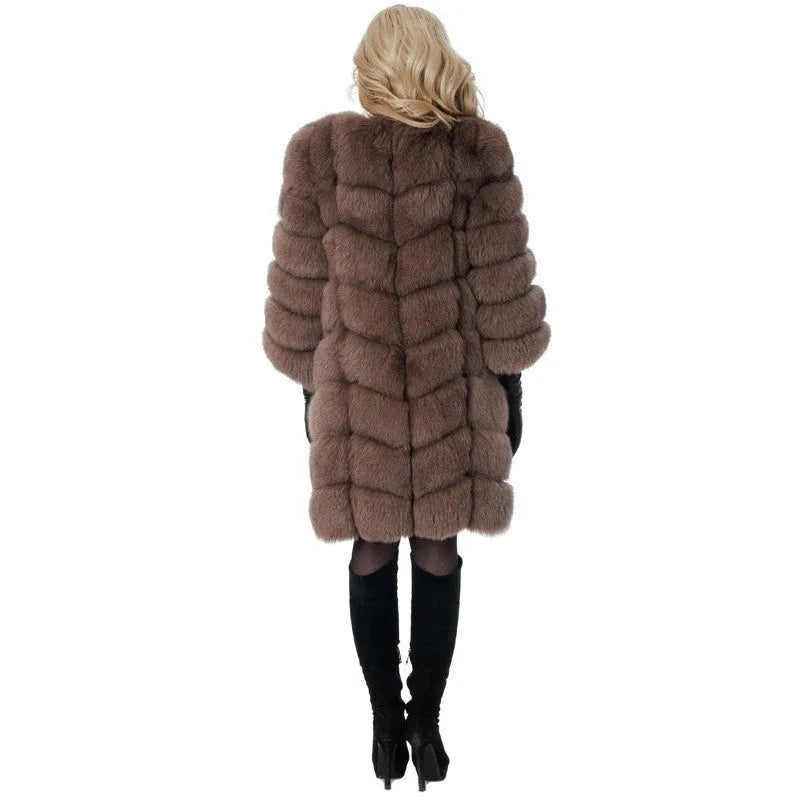 Women's long artificial fur coat in a range of colours on a hanger.