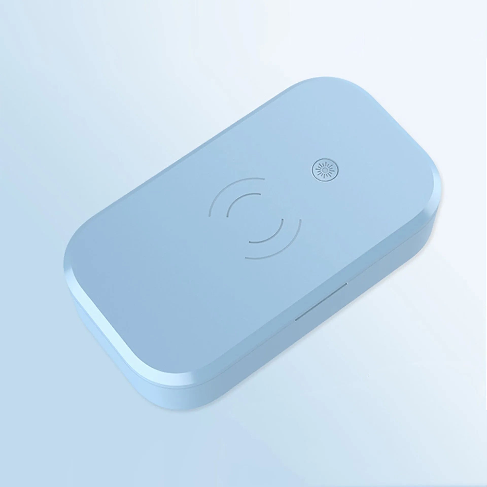 White ultraviolet disinfection box with wireless phone charging pad on top.