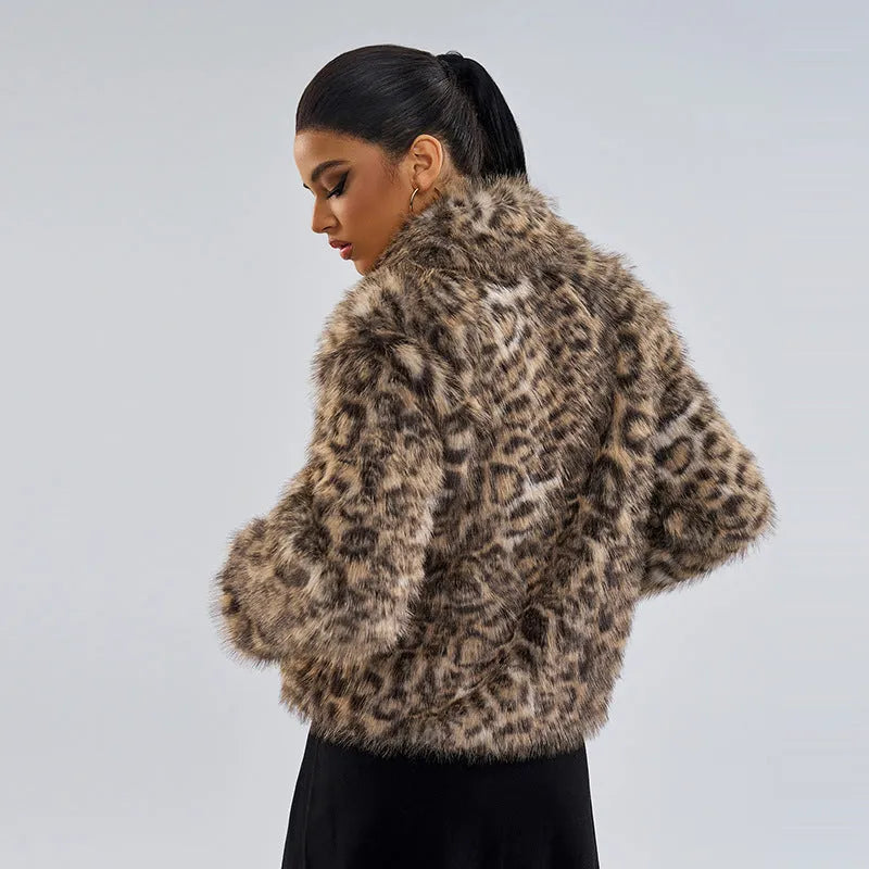 Women's leopard print coat with a buckle lapel detail on the collar