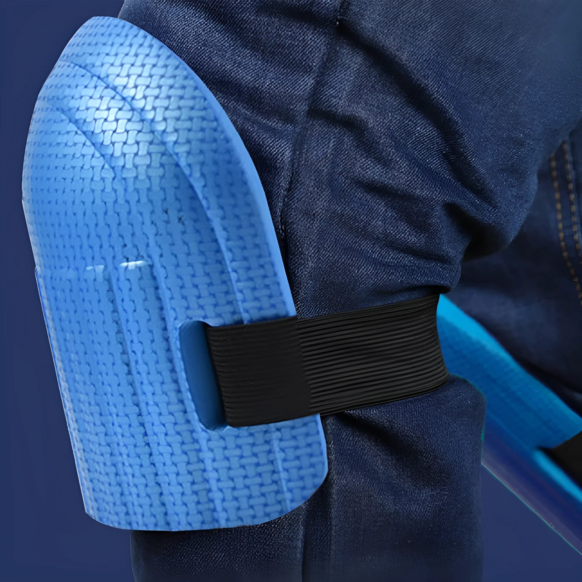 A pair of thick EVA foam kneepads in blue, designed for kneeling protection during auto repair or construction work.