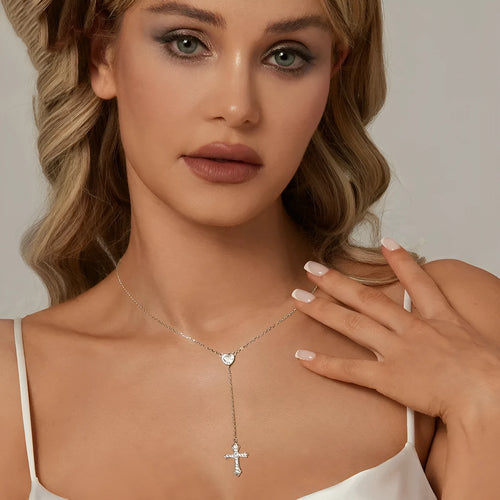 Women's silver love cross necklace with V-neck pendant on O-ring chain.