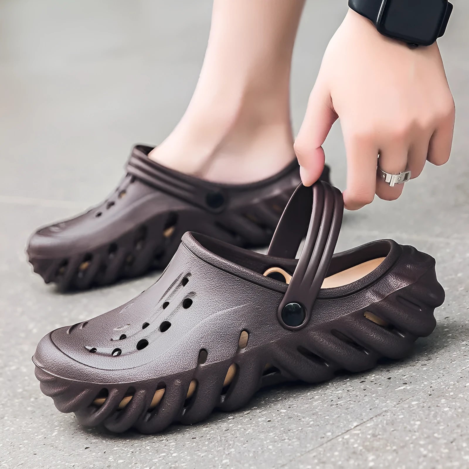 Men's beige EVA slipper sandals with a perforated upper and textured non-slip sole.