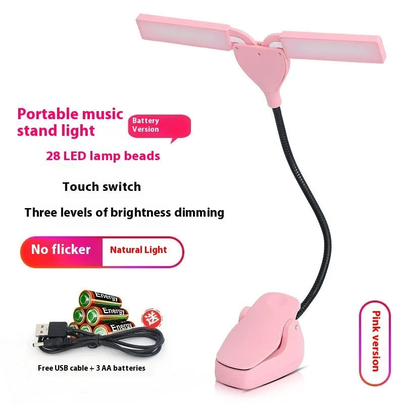 Black rechargeable music stand lamp with 28 LEDs clipped to a metal stand.
