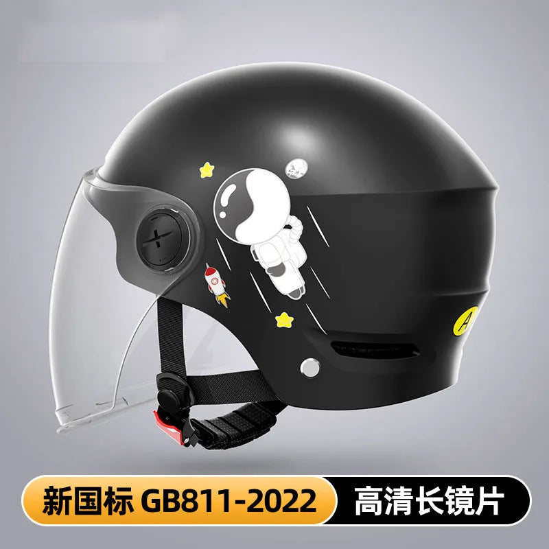 Khaki coloured open-face motorcycle helmet with integrated long mirror sunglasses on a table.