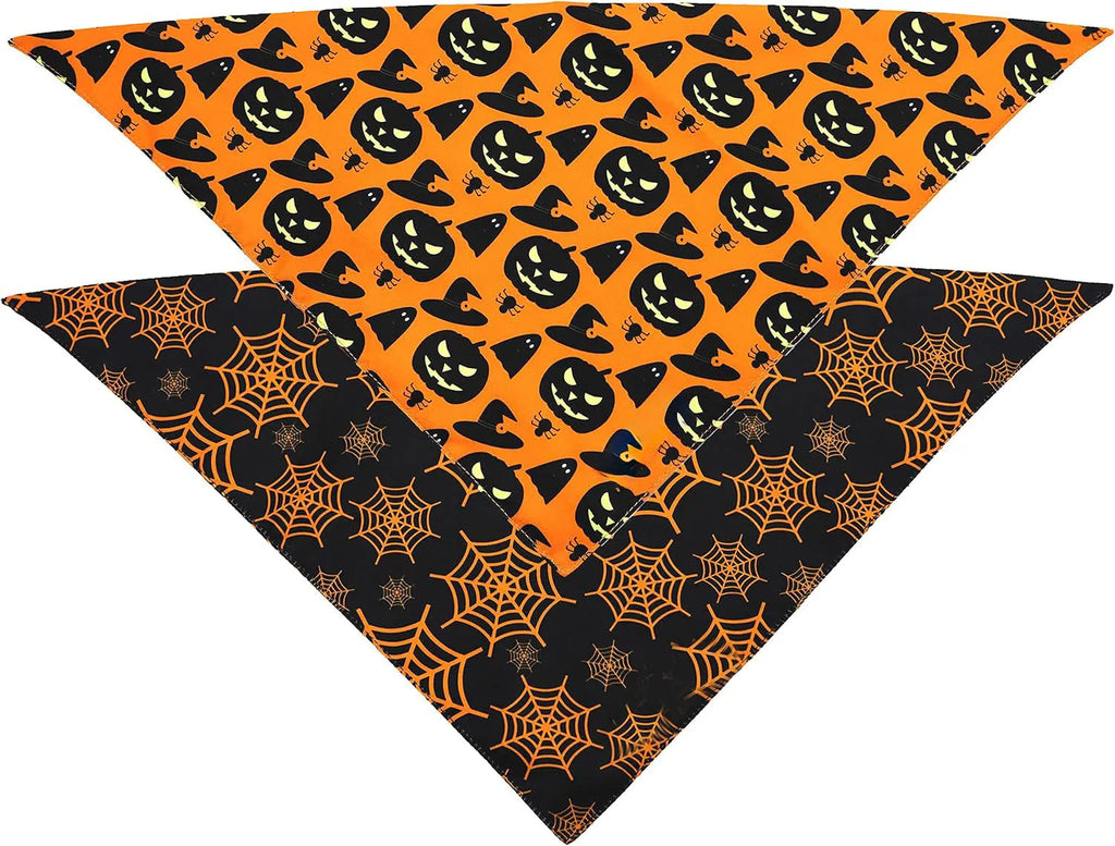 Reversible Halloween dog bandana showing pumpkin design on one side and spider web pattern on the other