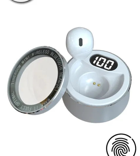Close-up of a tiny skin-toned 9mm Bluetooth earpiece designed to be invisible in the ear.