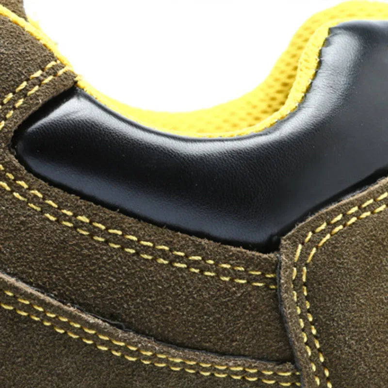 Bronze coloured cow suede leather safety shoes with a steel toe cap and low-cut design.
