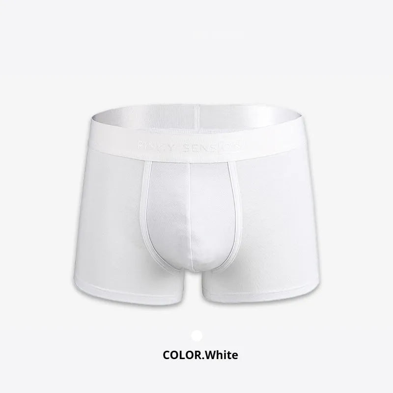Men's solid colour cotton boxer shorts in black, shown in a loose fit style.