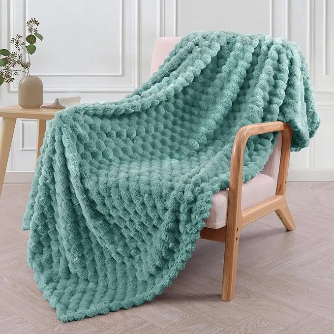 Children's soft plaid polyester blanket shown in camel colour, suitable for nap time.