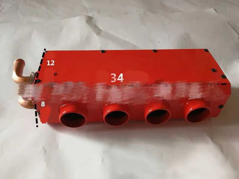 Metal car heater unit with copper pipe radiator and electrical connections for 12V 24V vehicle systems.