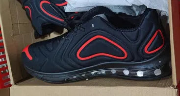 Men's black lace-up sneakers with a thick sole and round toe for outdoor sports.