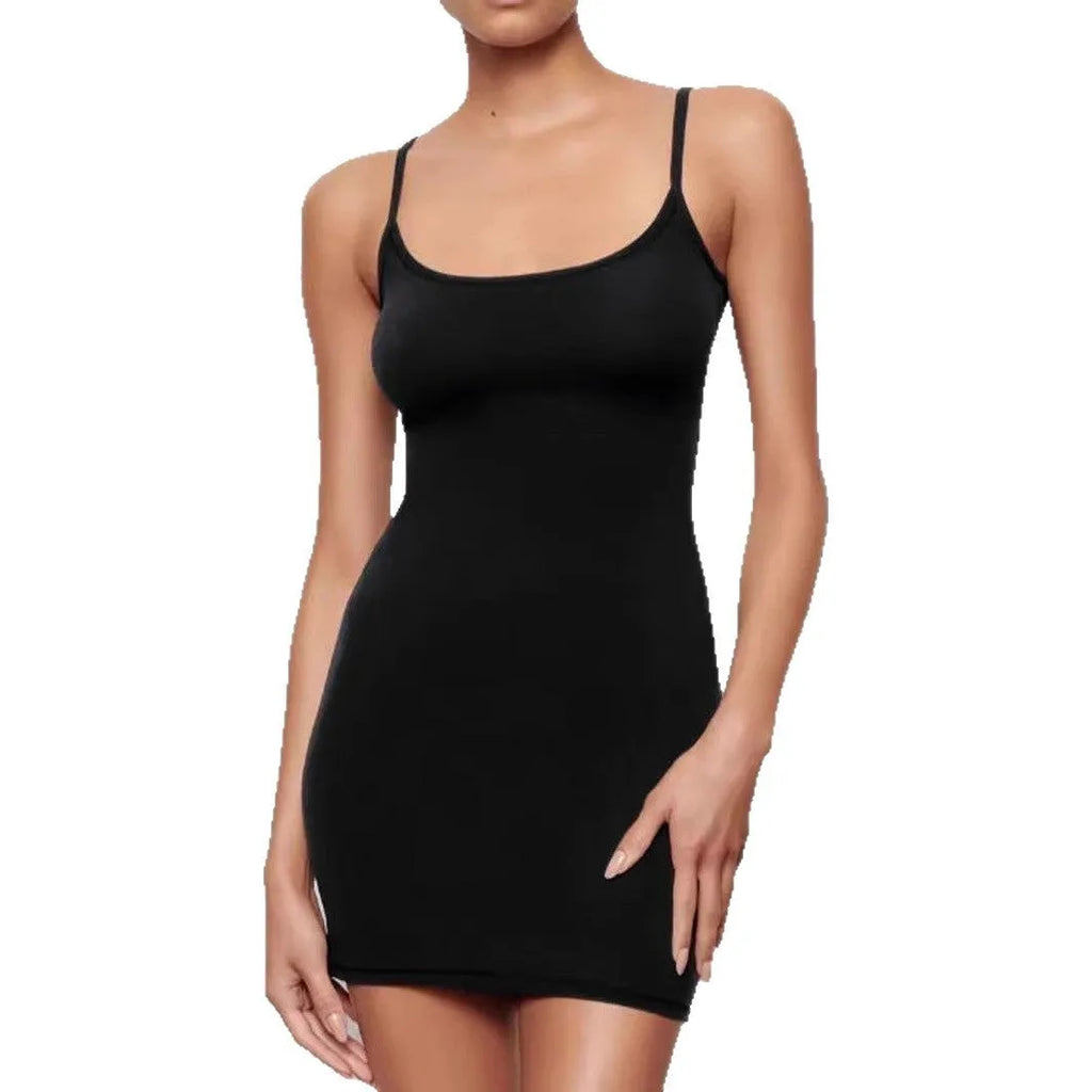 Black sleeveless sling dress with a slim sheath silhouette and short skirt.