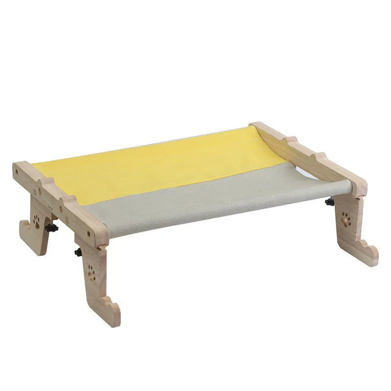 Wooden framed cat hanging hammock bed mounted on a window sill, available in seven style variations.