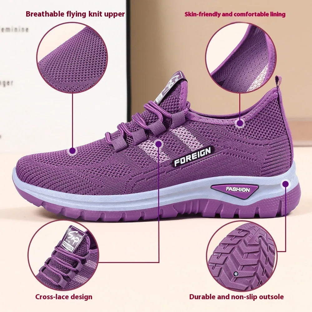 Women's low-top casual sneakers in black with breathable mesh upper and flat PVC sole
