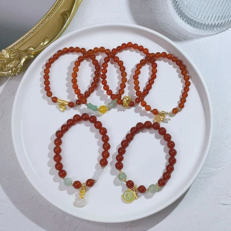 Chinese style red agate bracelet for women with dragon design, manual craftsmanship.