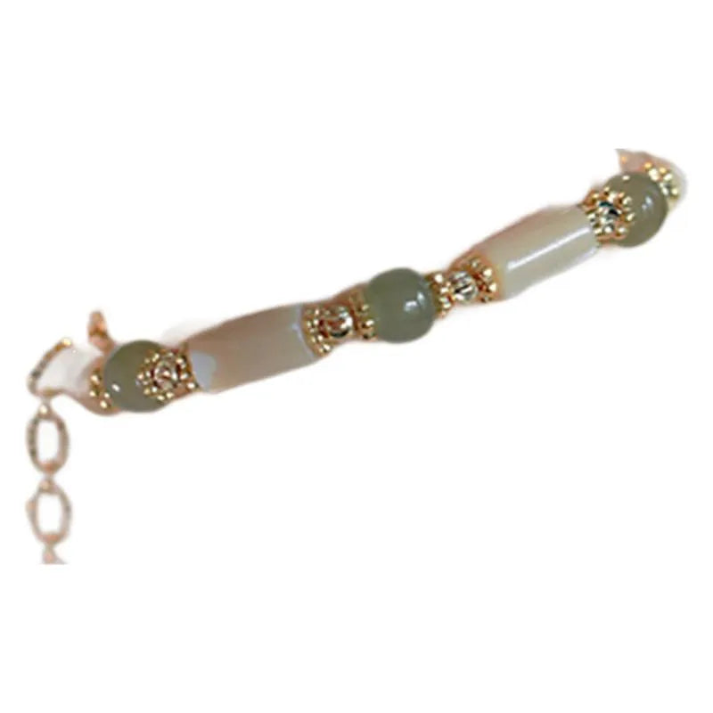 Natural Hetian jade white lip shell bracelet with geometric round beads in simple design