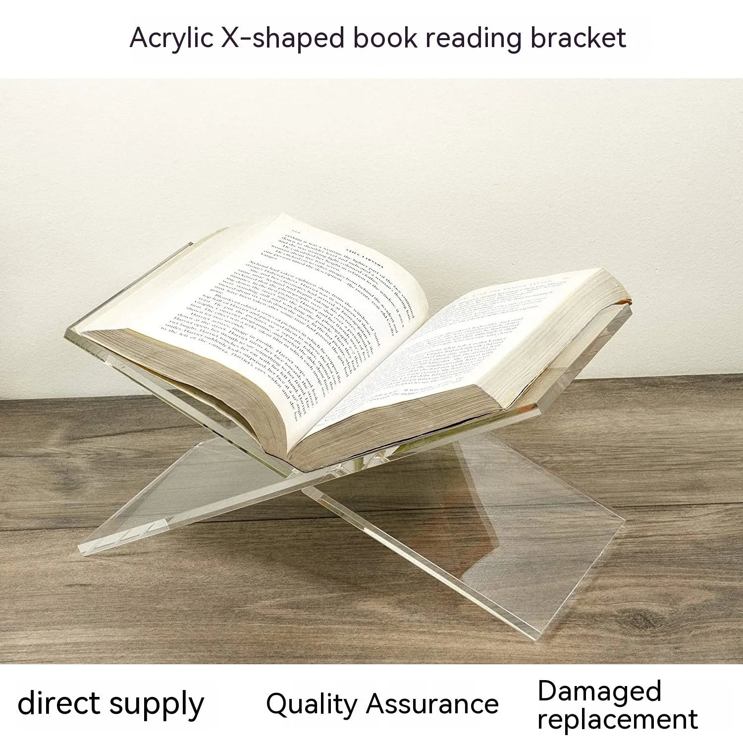 Clear acrylic X-shaped book display rack on desktop with books