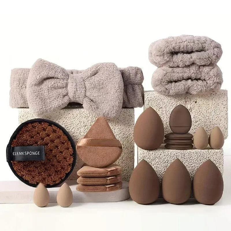 Beauty tool combination set with multiple pieces in brown, pink, and purple colours for face wash and makeup application