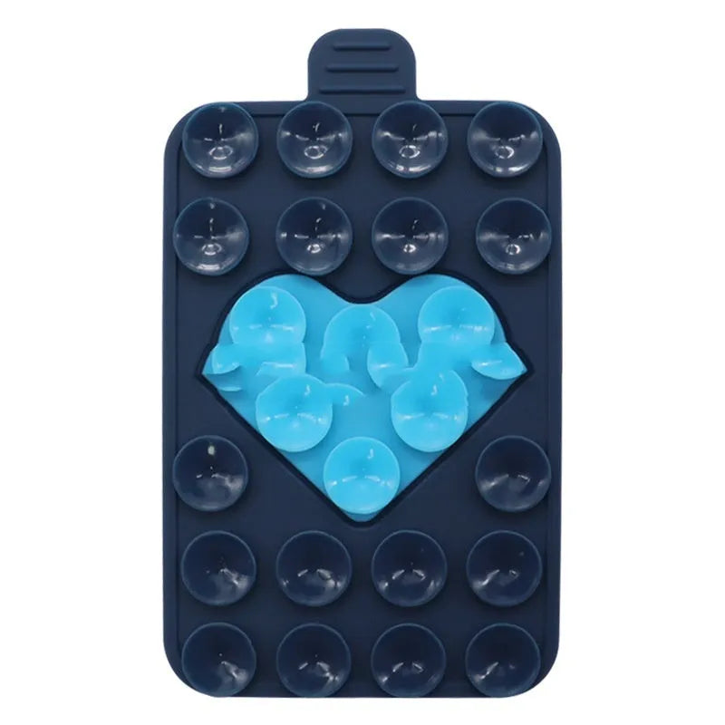Double sided silicone suction cup phone case holder in gray white, showing hot pressed construction for universal fit on smooth surfaces