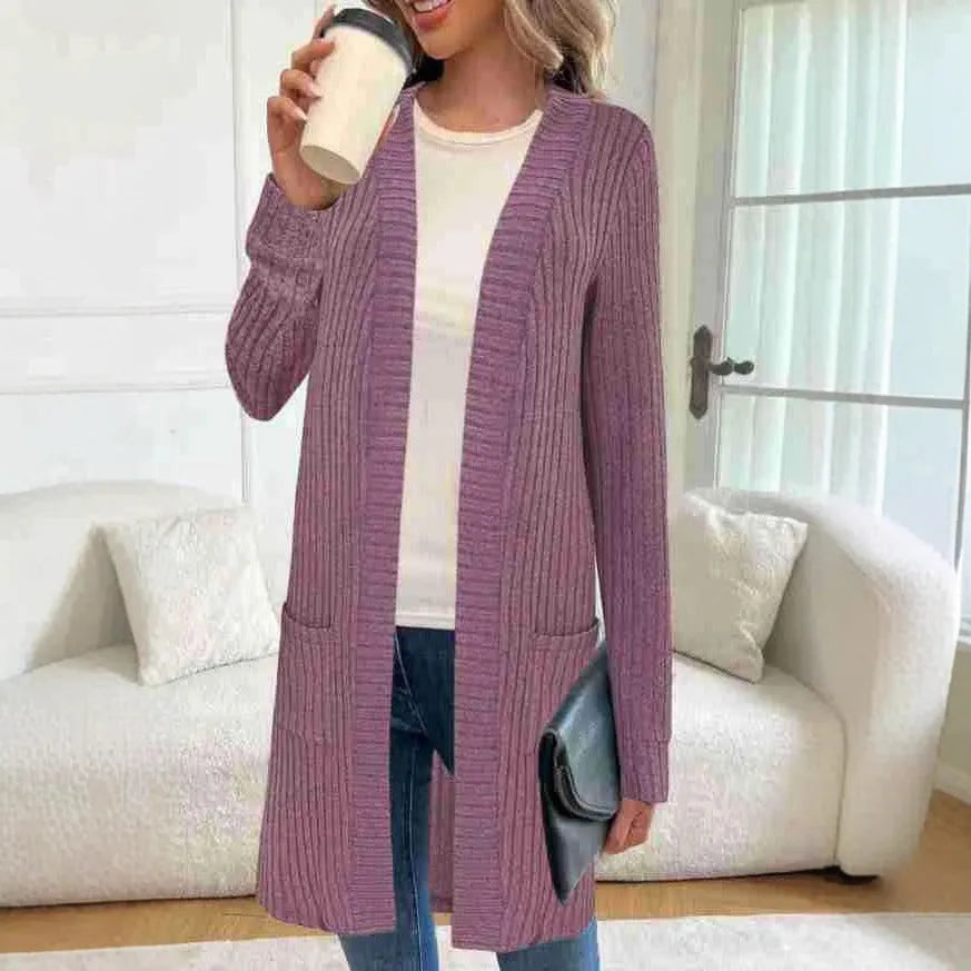 Long sleeve loose cardigan jacket in black, wine red, or grey with pockets, shown on a hanger.