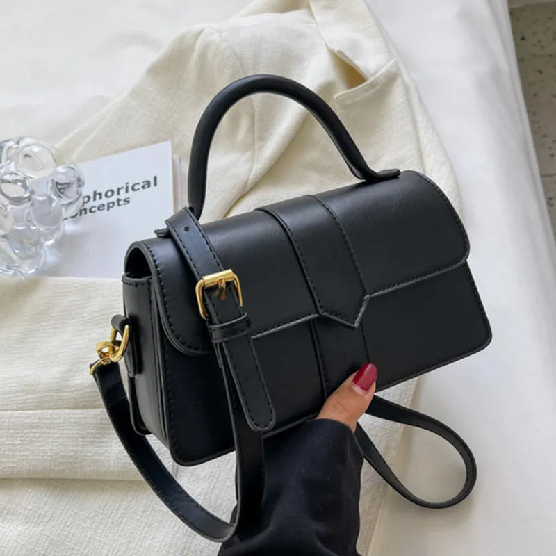 Women's PU leather messenger bag in neutral colour with file organiser interior and sandwich pocket