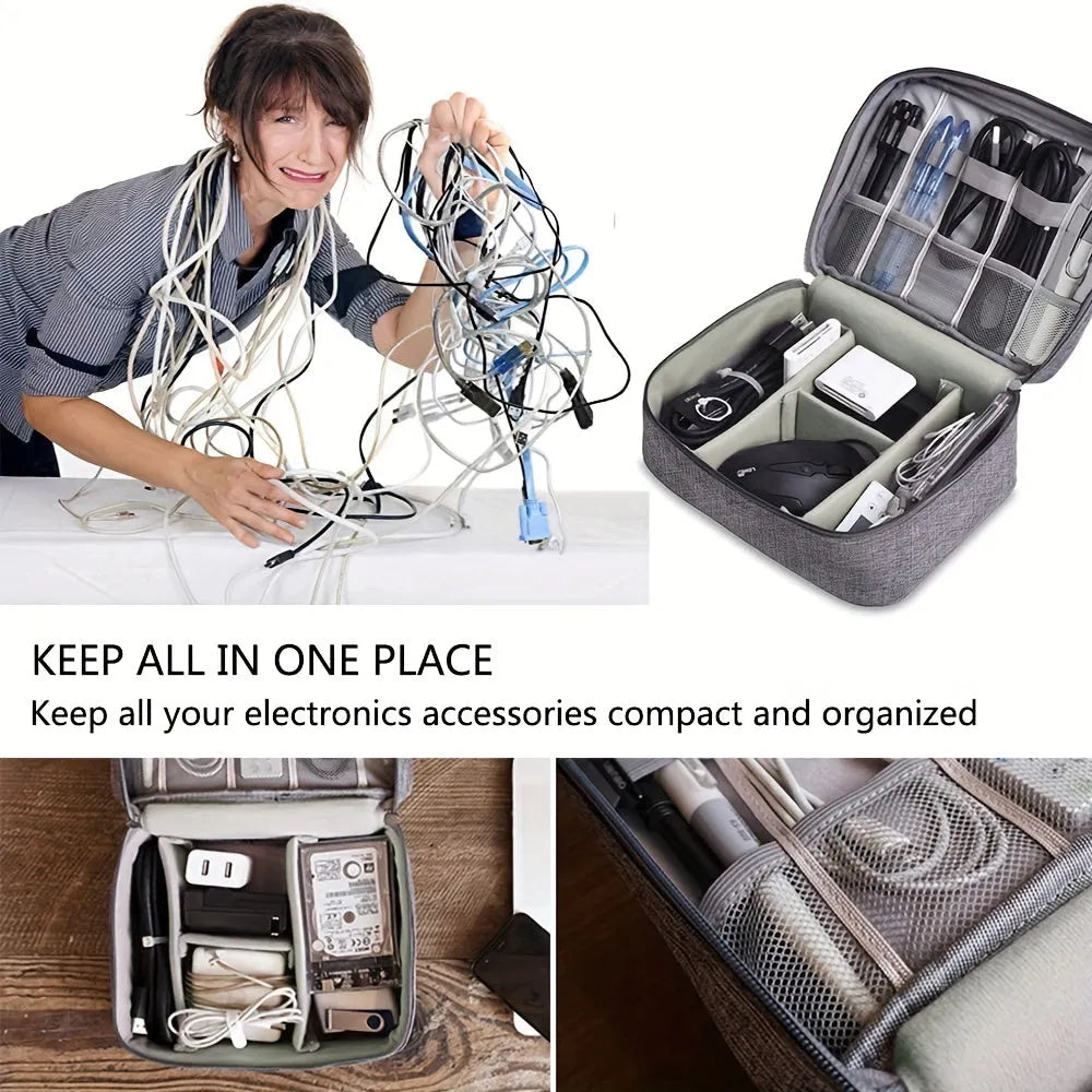 Black waterproof electronics organiser bag open, showing mesh pockets, elastic loops, and removable padded dividers inside.