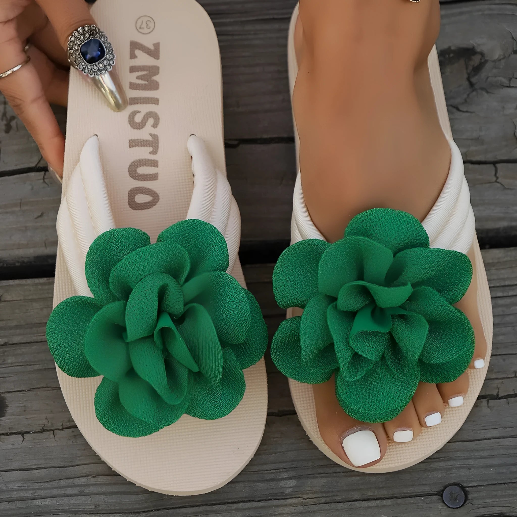 Plus size women's PU leather flip-flop slippers with floral detail, shown in beige, green, and rose red.