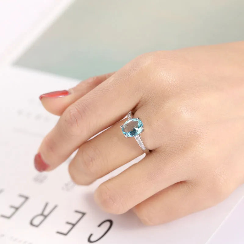 Ocean blue zircon copper ring in simple geometric women's style, sizes 6 to 10