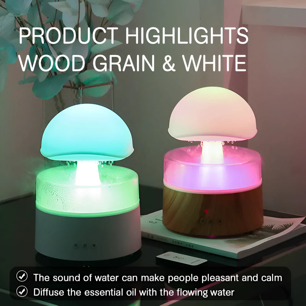 White cloud-shaped ultrasonic aroma diffuser and humidifier with simulated raindrops and coloured lights.