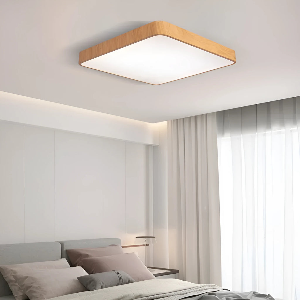 Square Nordic-style ceiling light with iron frame and wood grain finish, shown in a modern bedroom setting.